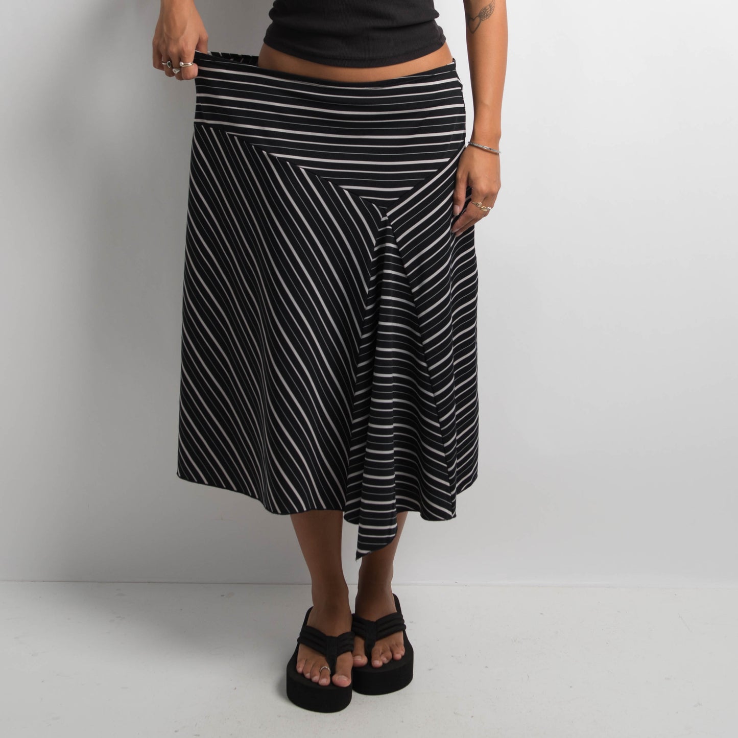 STRIPED ASYMMETRIC SKIRT