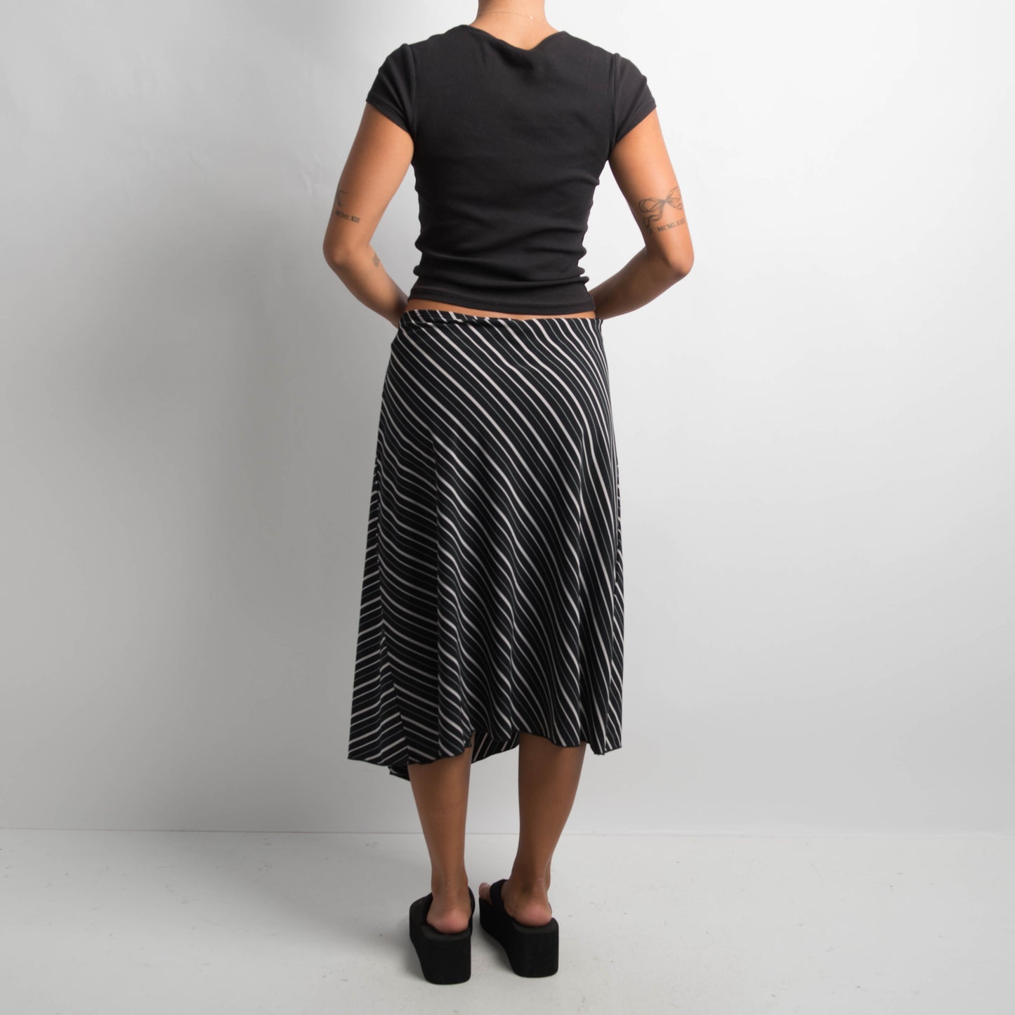 STRIPED ASYMMETRIC SKIRT