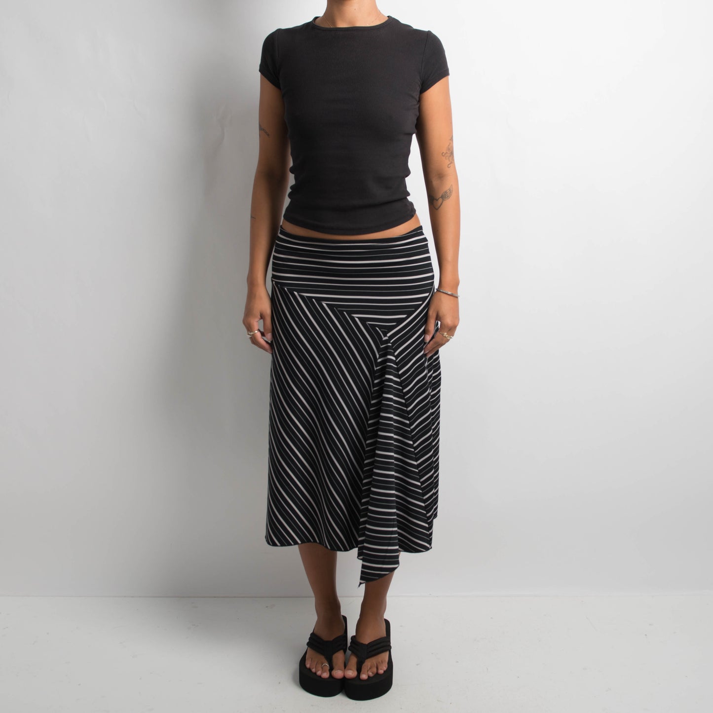 STRIPED ASYMMETRIC SKIRT