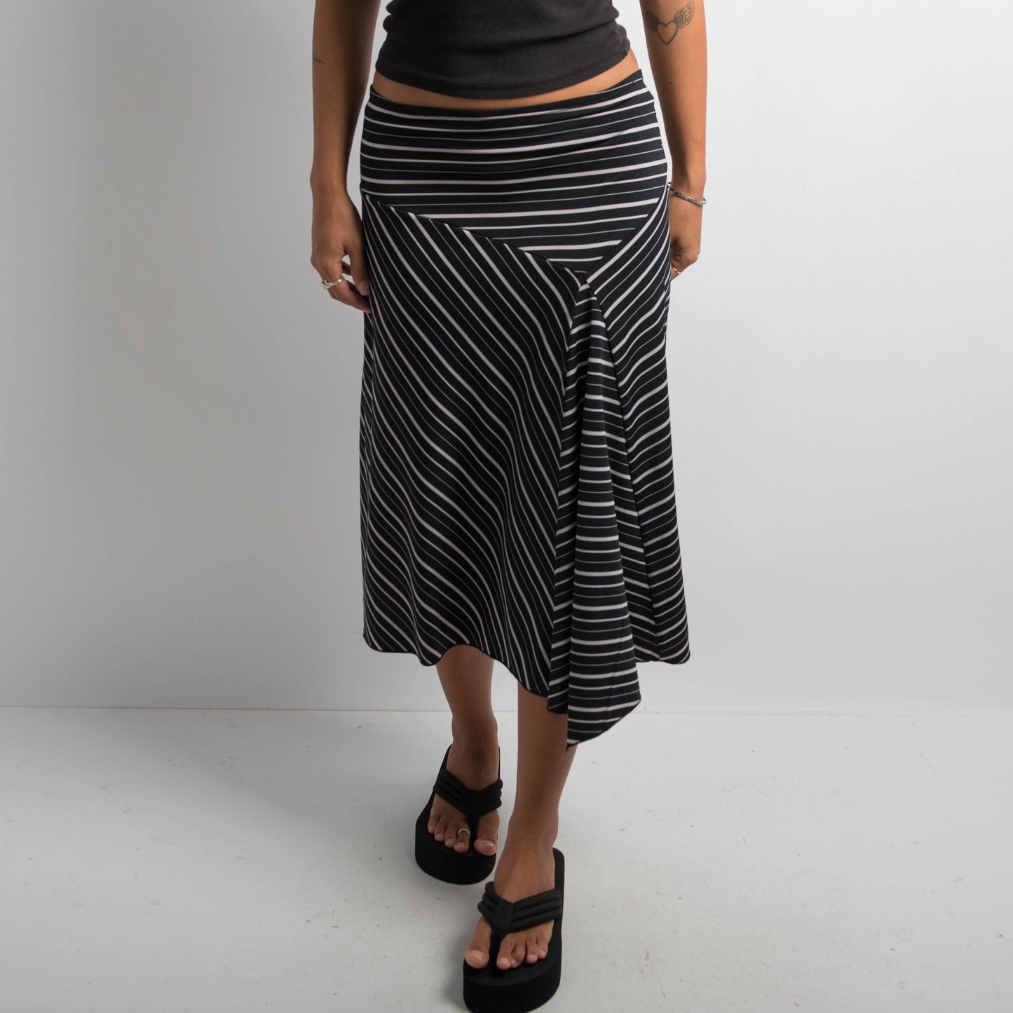 STRIPED ASYMMETRIC SKIRT