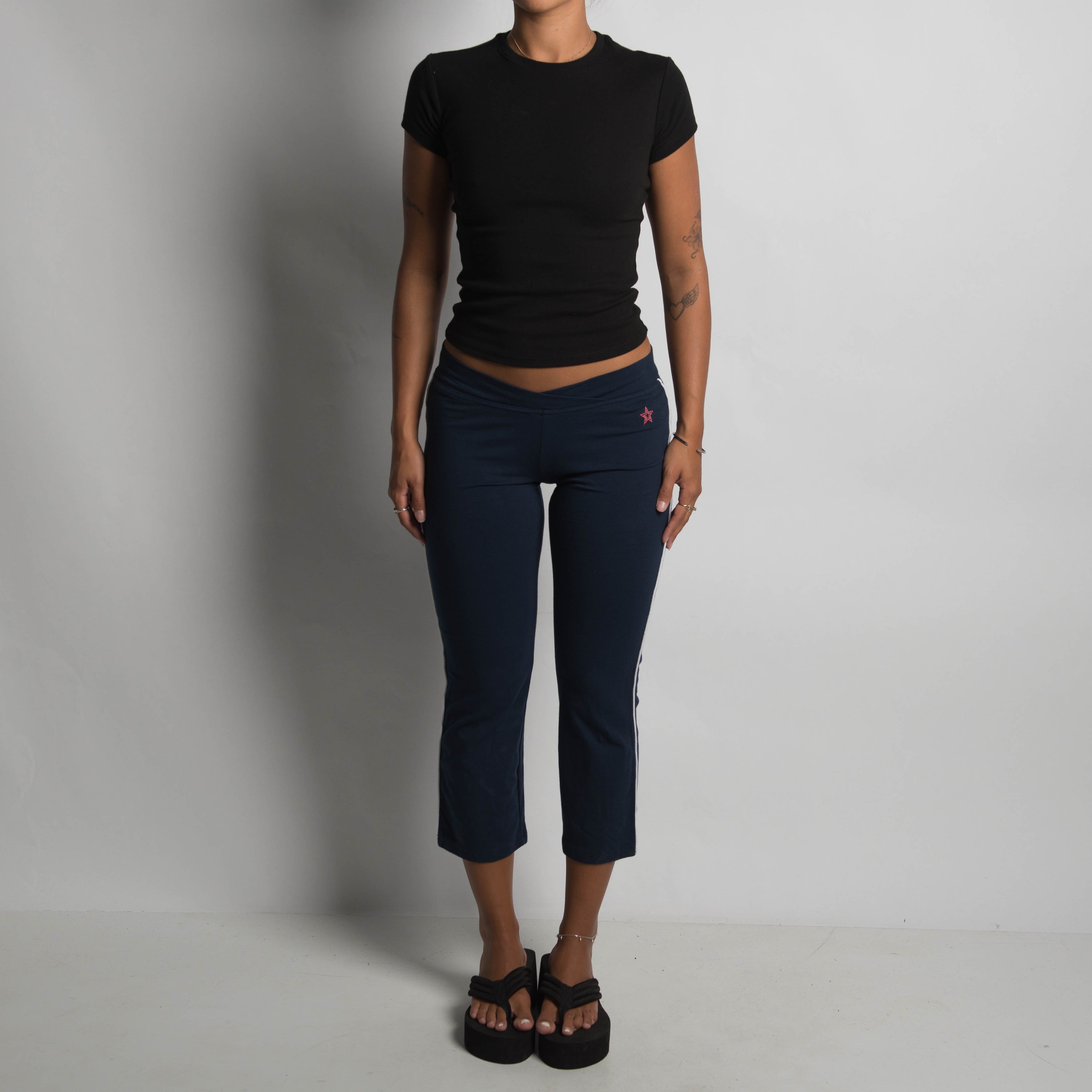 NAVY CROP KICK FLARE PANTS