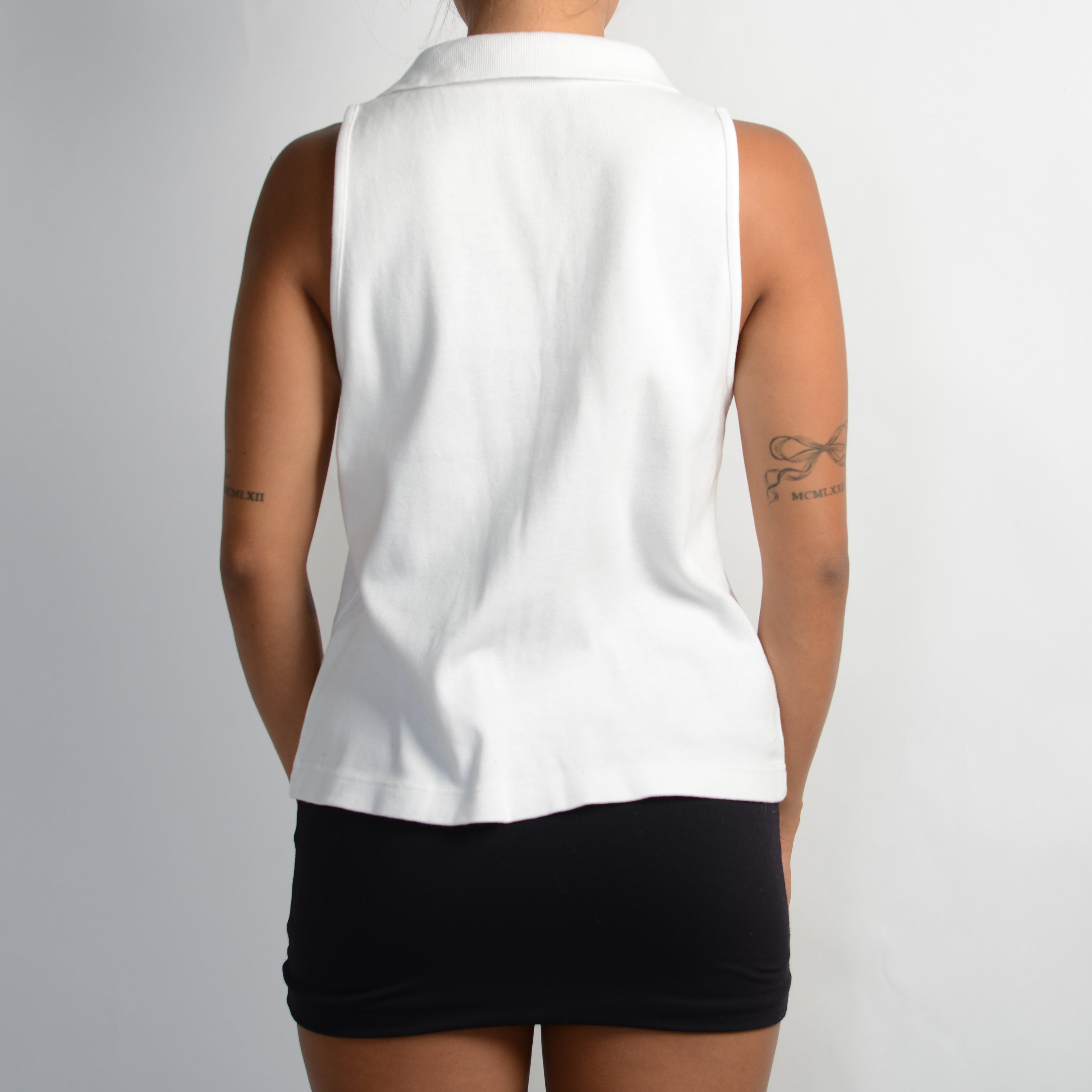 WHITE SLEEVELESS POLO