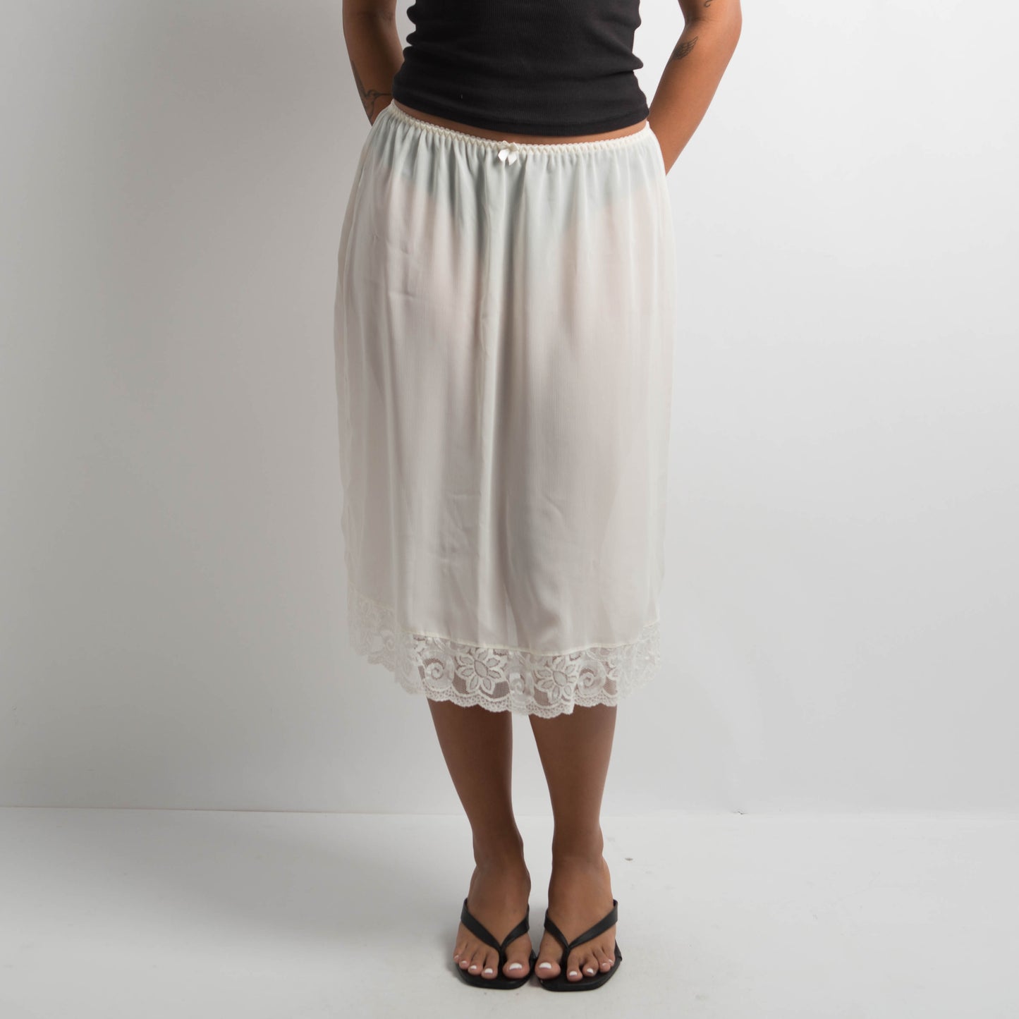 IVORY SLIP MIDI SKIRT
