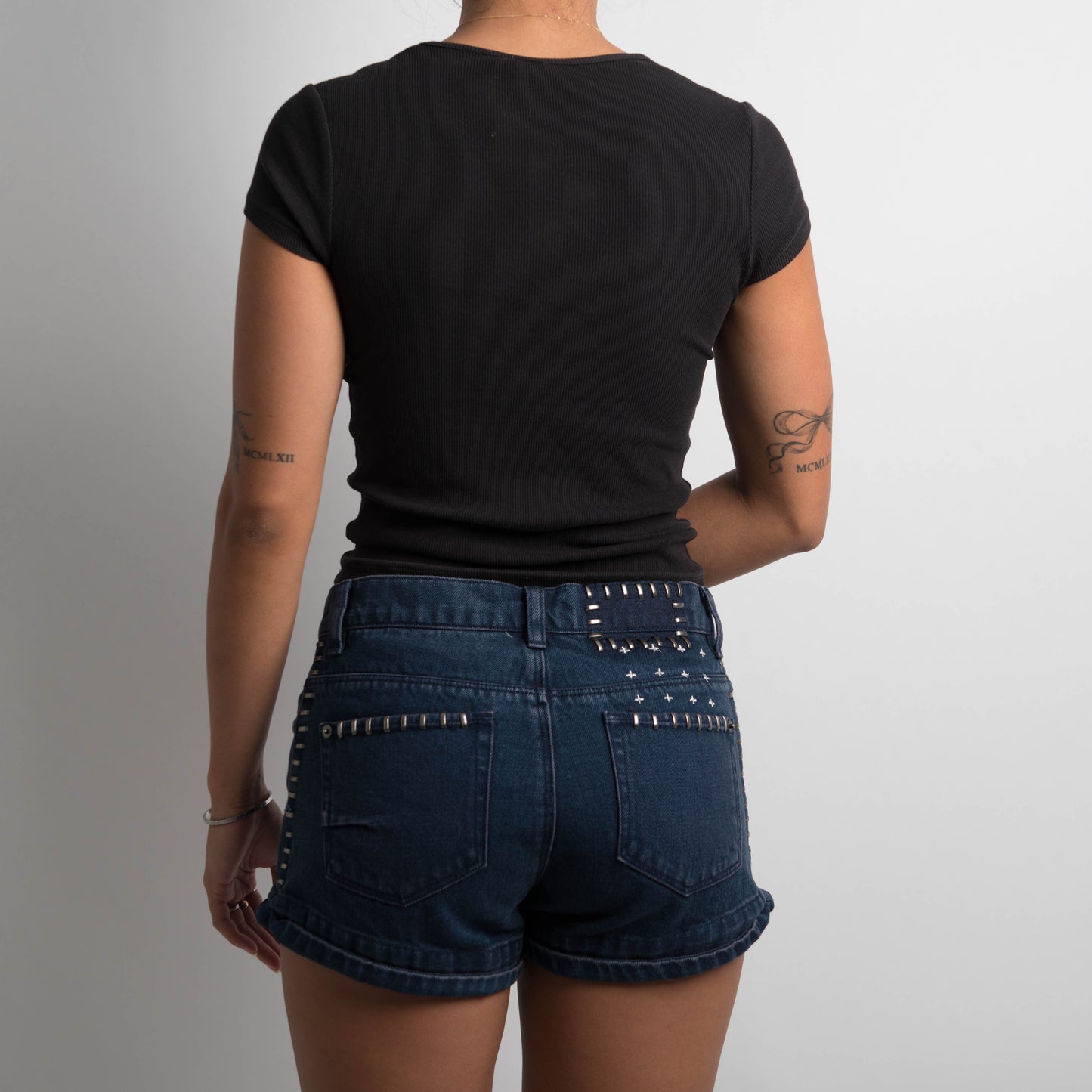 NAVY DENIM STUDDED MINI SHORTS