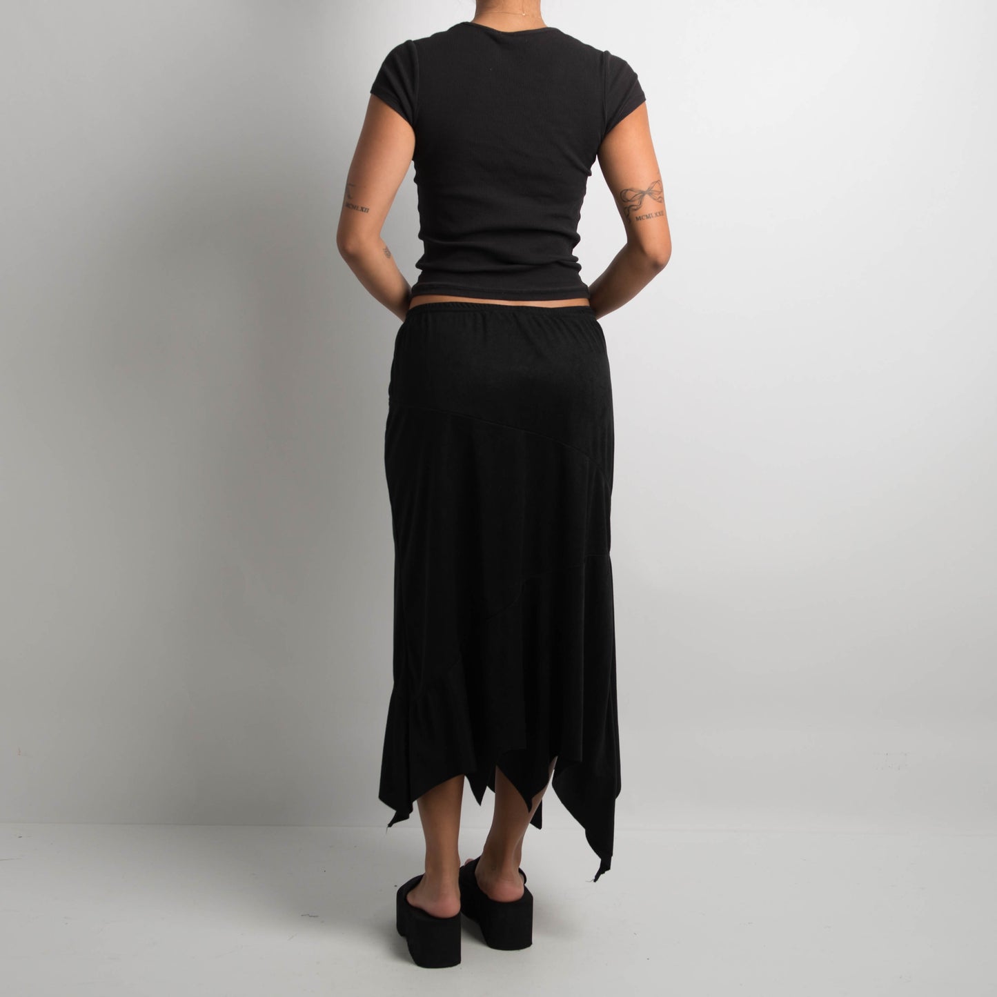 BLACK SUEDETTE ASYMMETRIC SKIRT