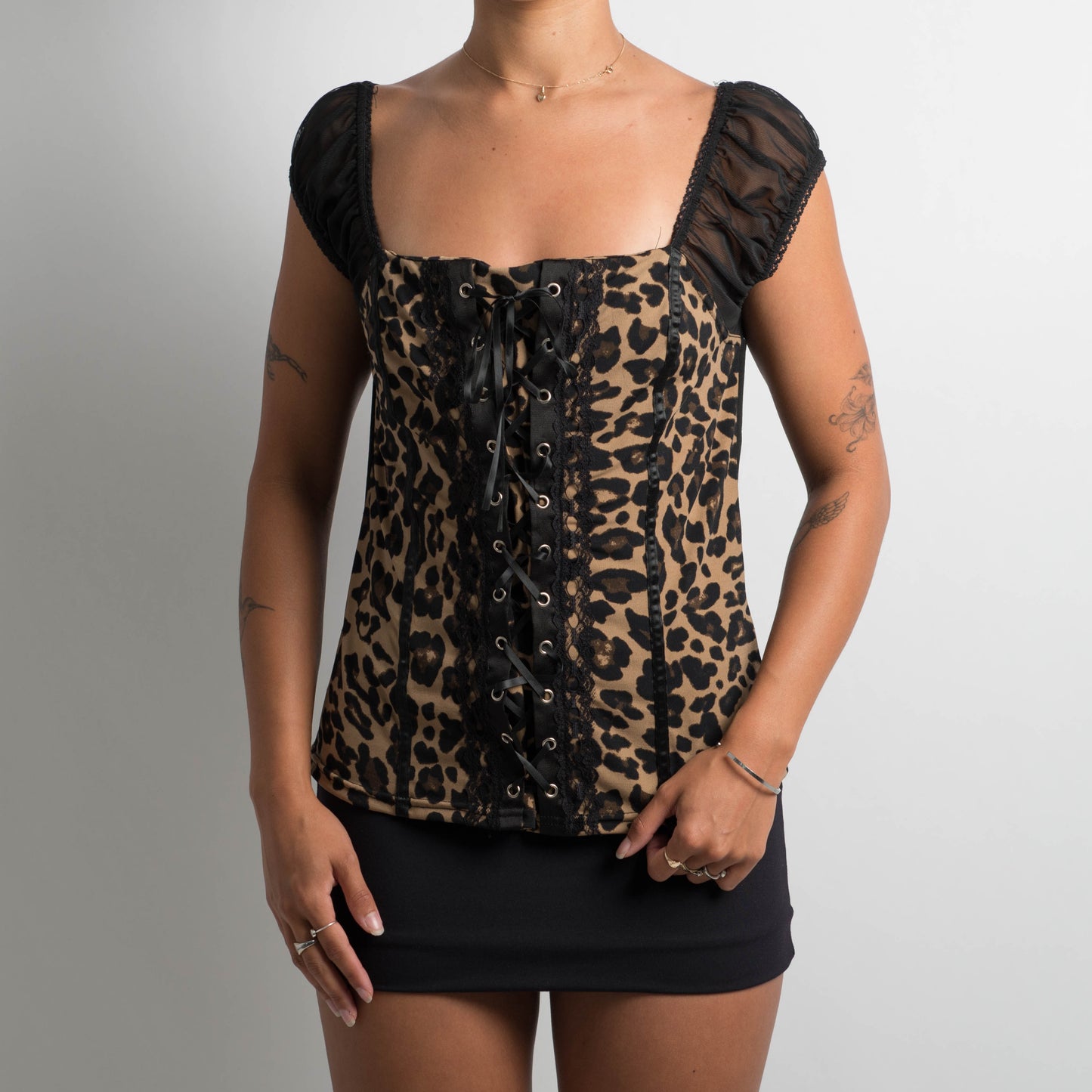 ANIMAL PRINT LACE UP TOP