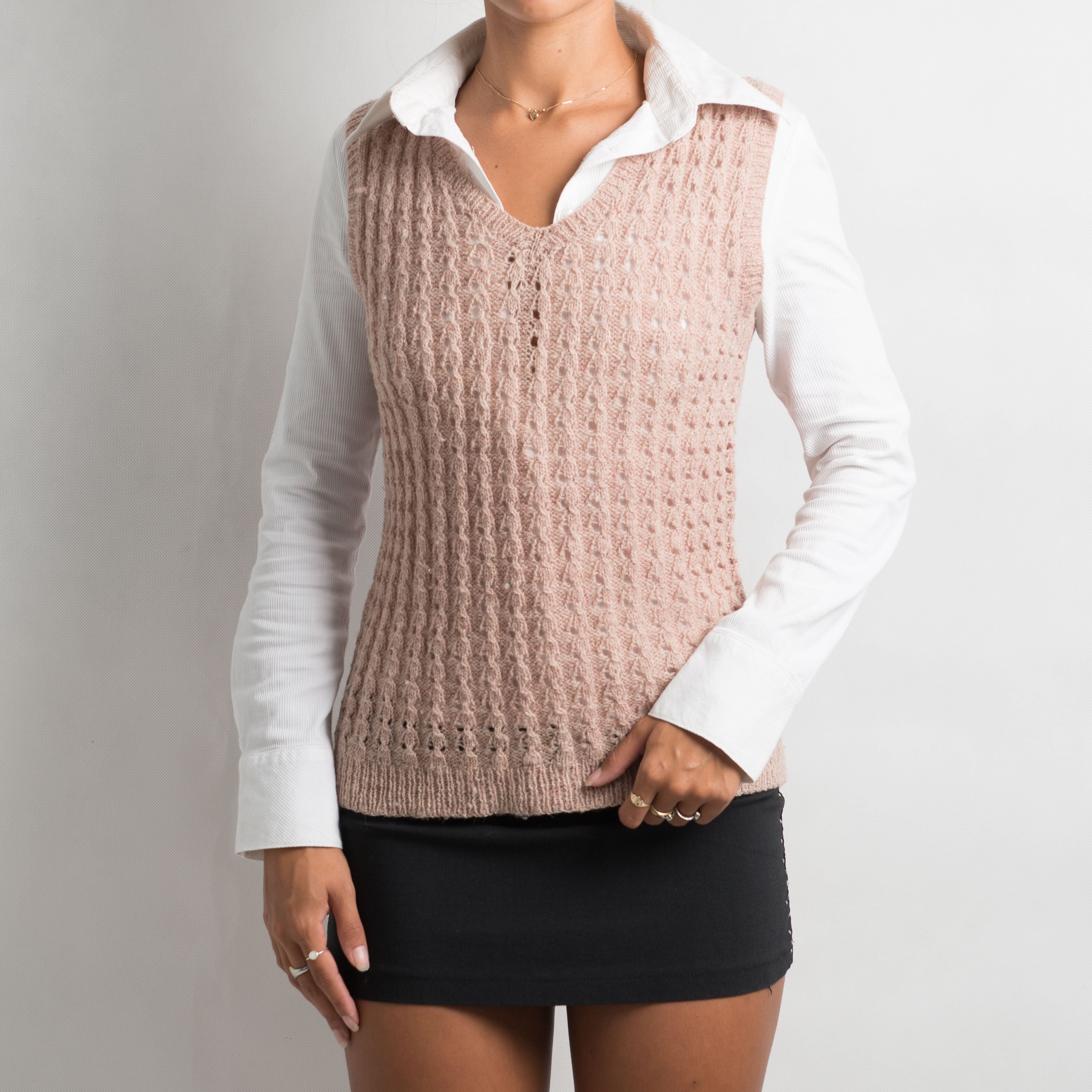 GILET EN TRICOT ROSE