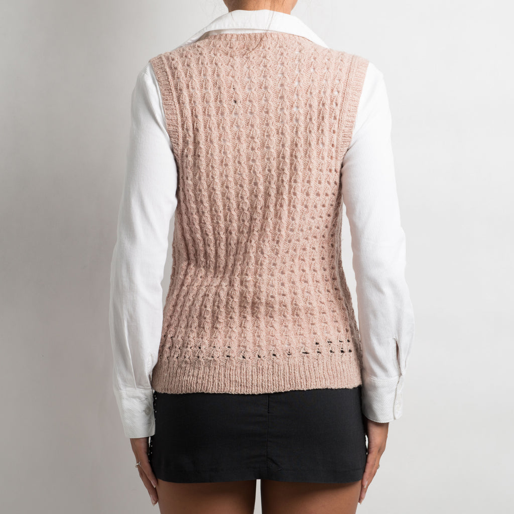 GILET EN TRICOT ROSE
