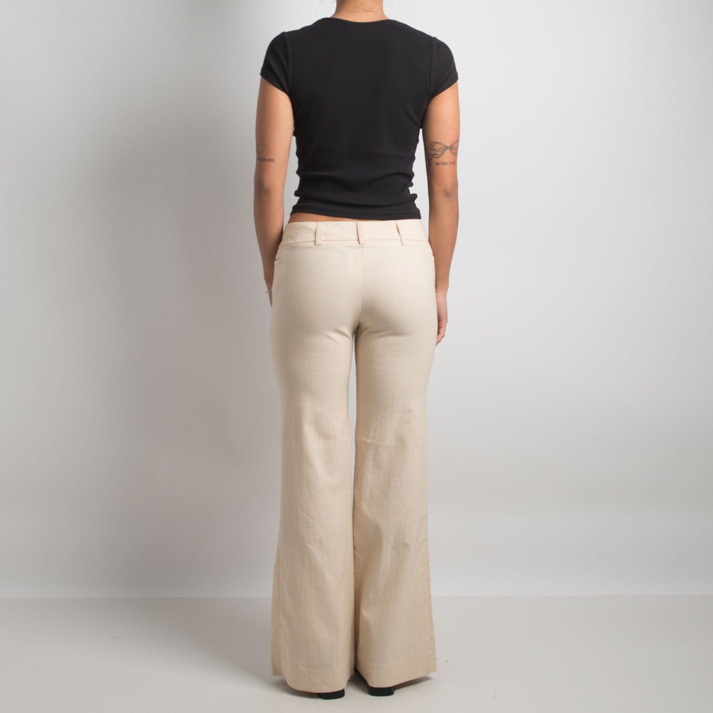 CREAM PATTERNED FLARED TROUSERS