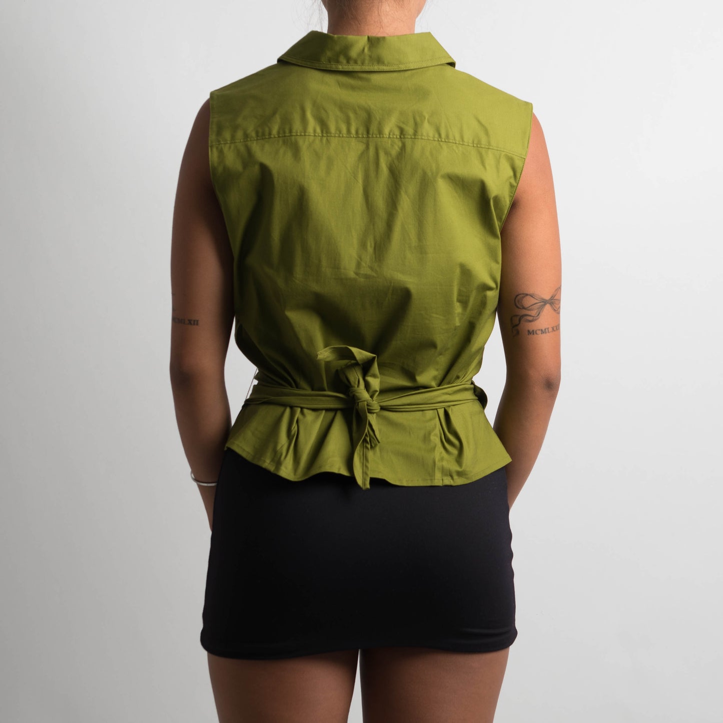 GREEN SLEEVELESS WRAP BLOUSE