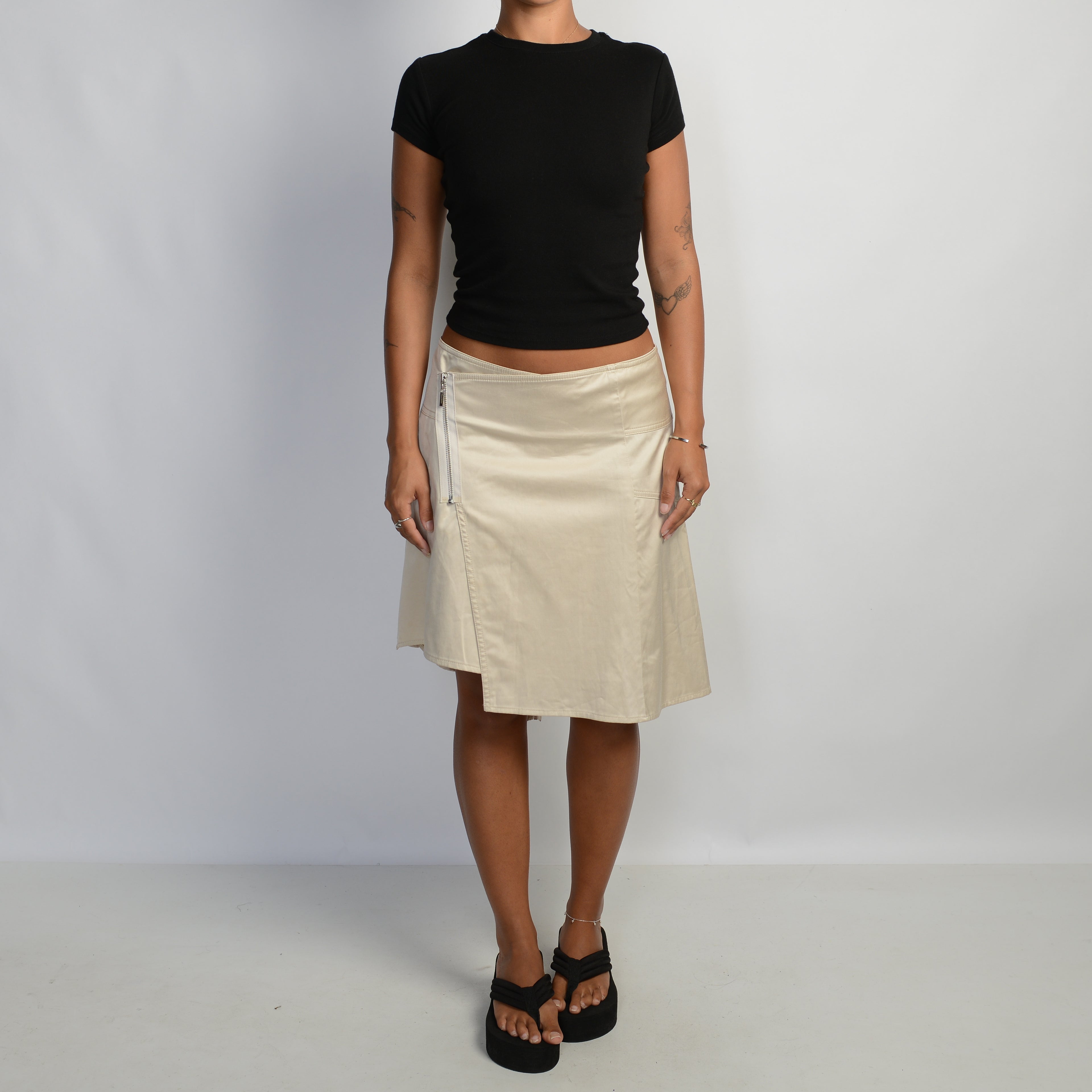 CREAM ASYMMETRIC SKIRT