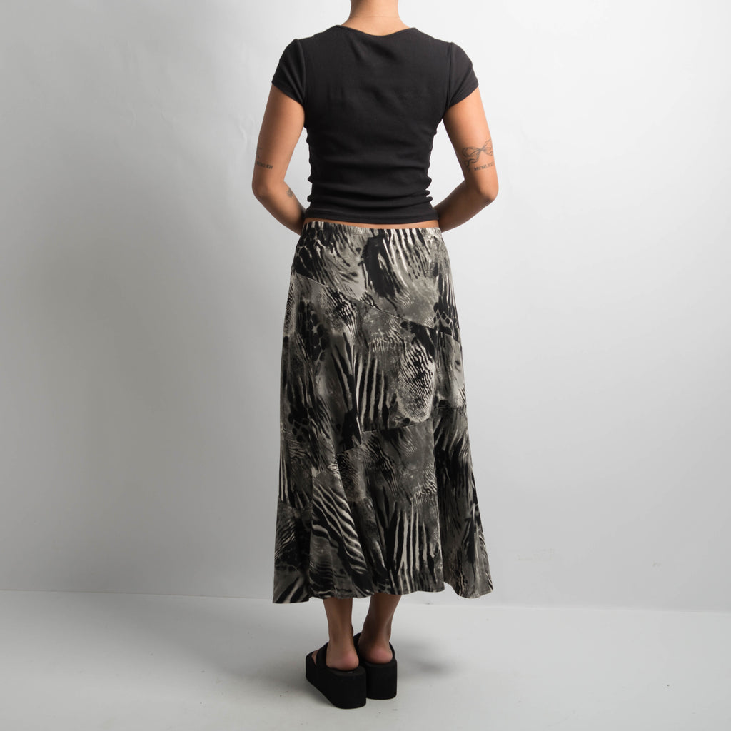 SLINKY LONGLINE SKIRT