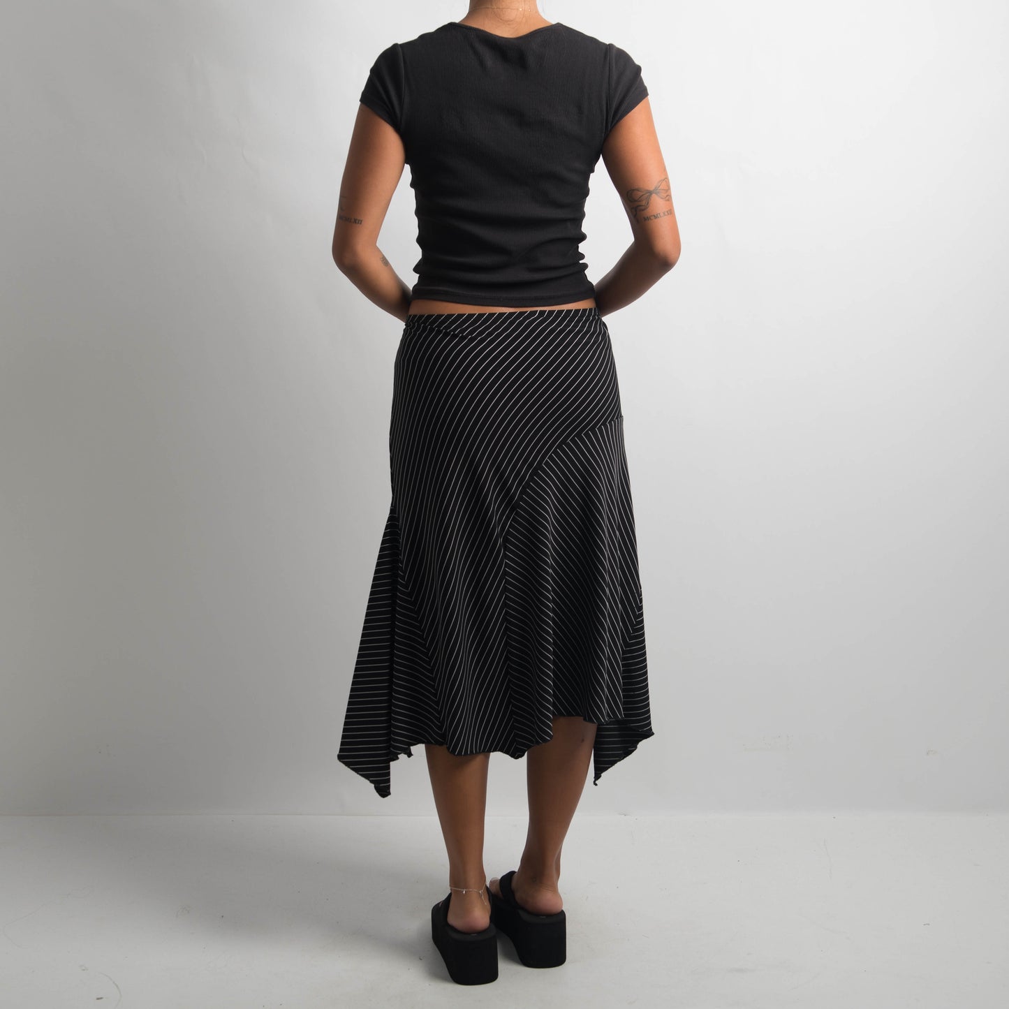 STRIPE ASYMMETRIC MIDI SKIRT