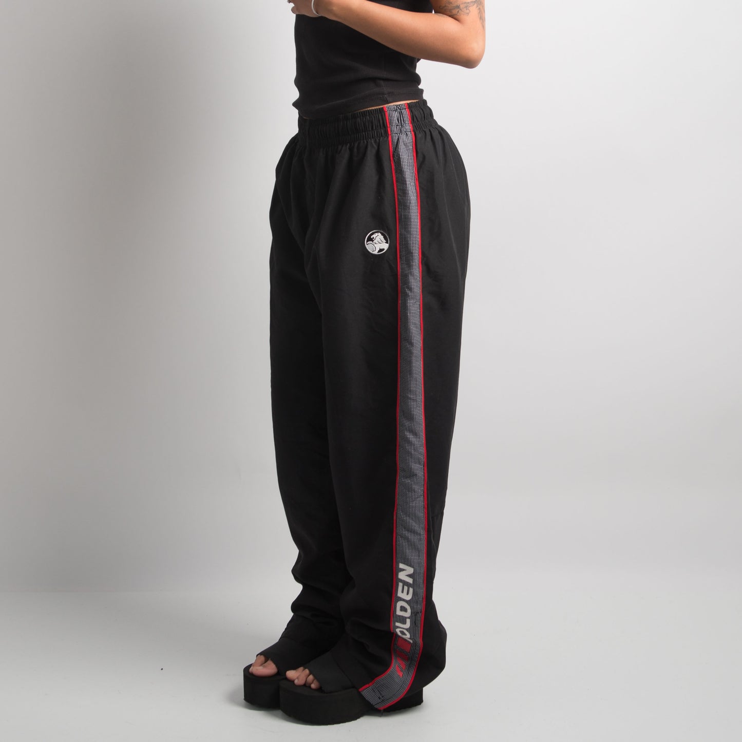 BLACK HOLDEN TRACKPANTS