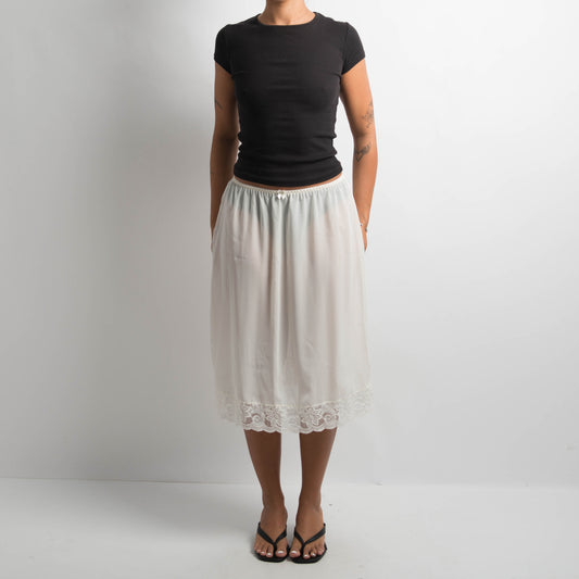 IVORY SLIP MIDI SKIRT