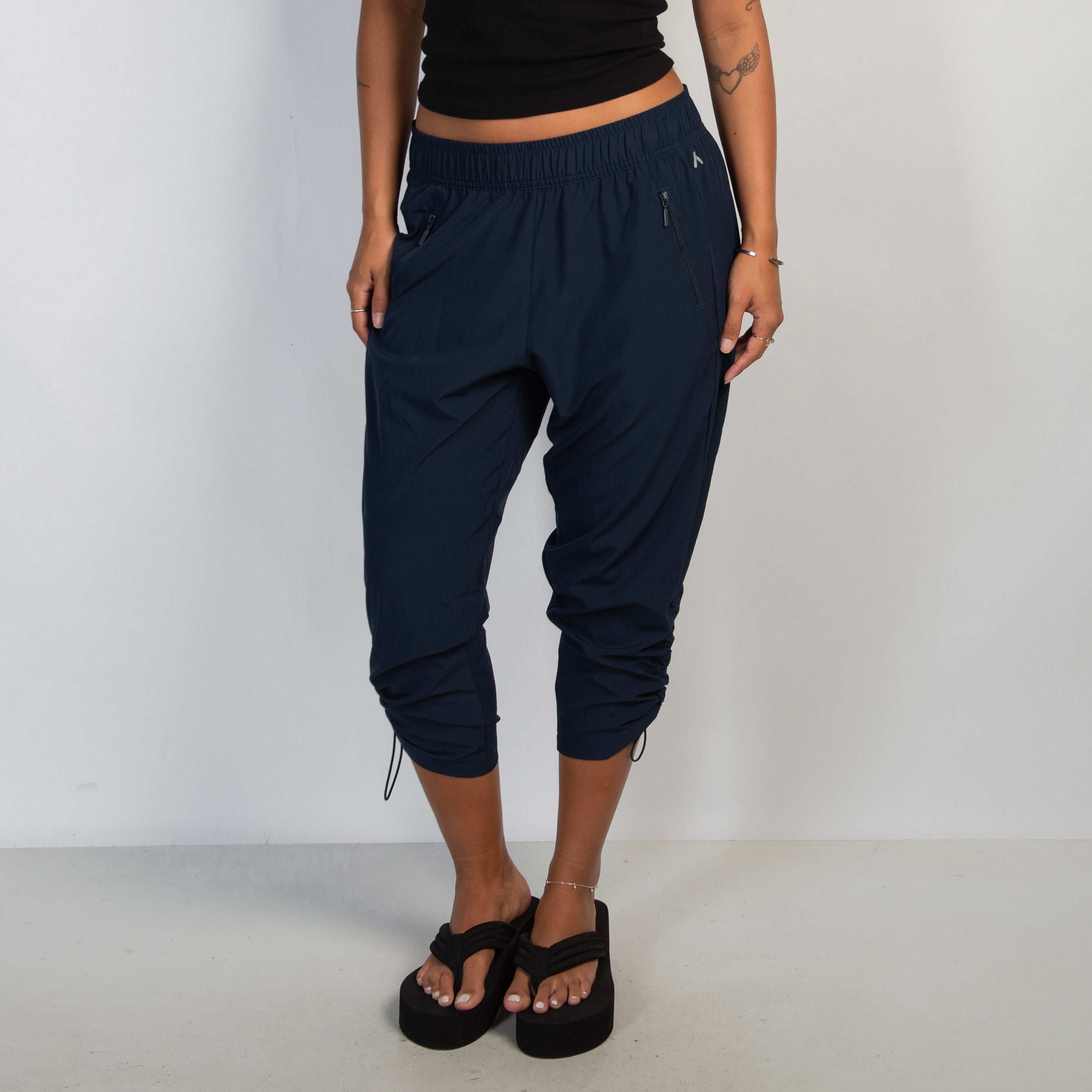 NAVY CROP PANTS