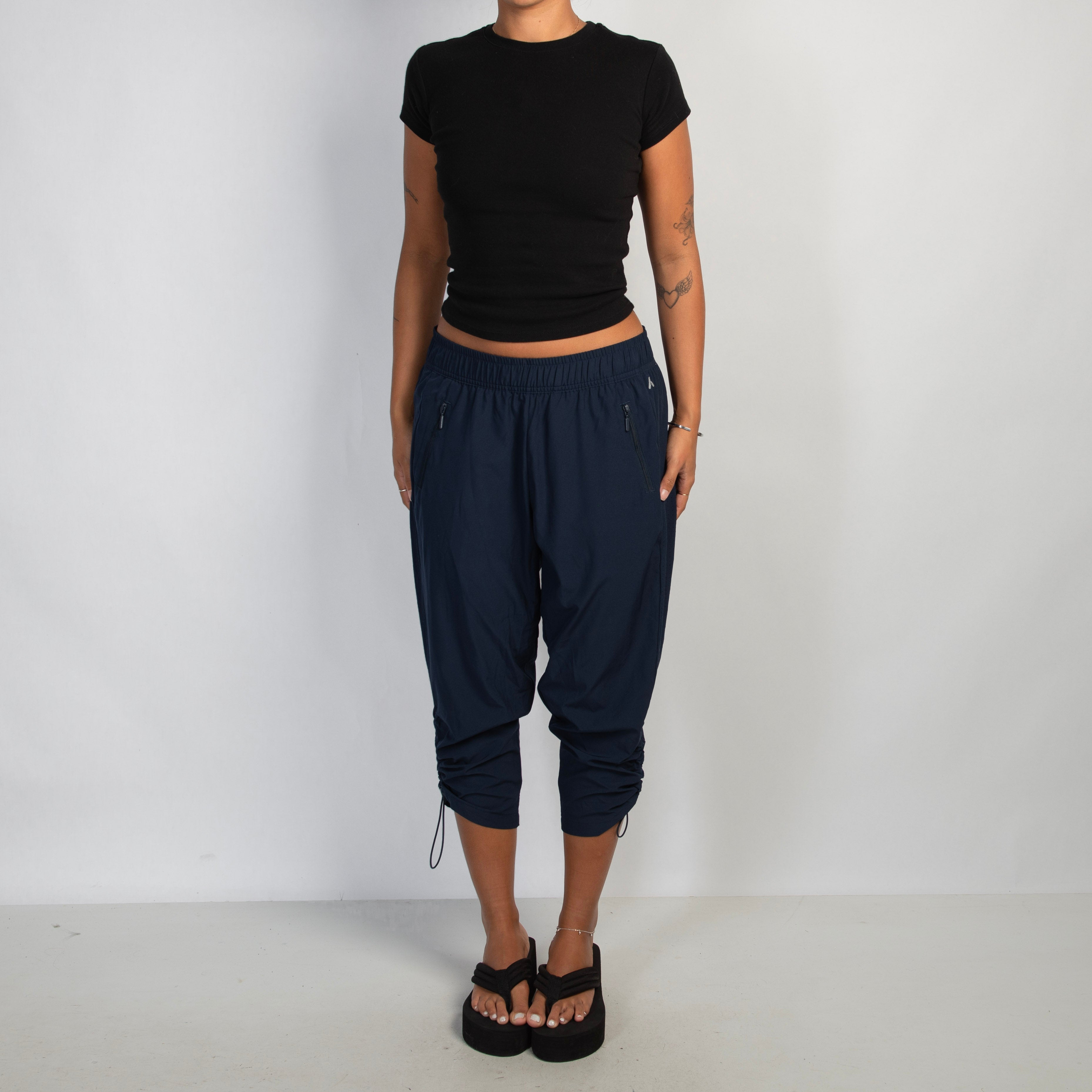 NAVY CROP PANTS