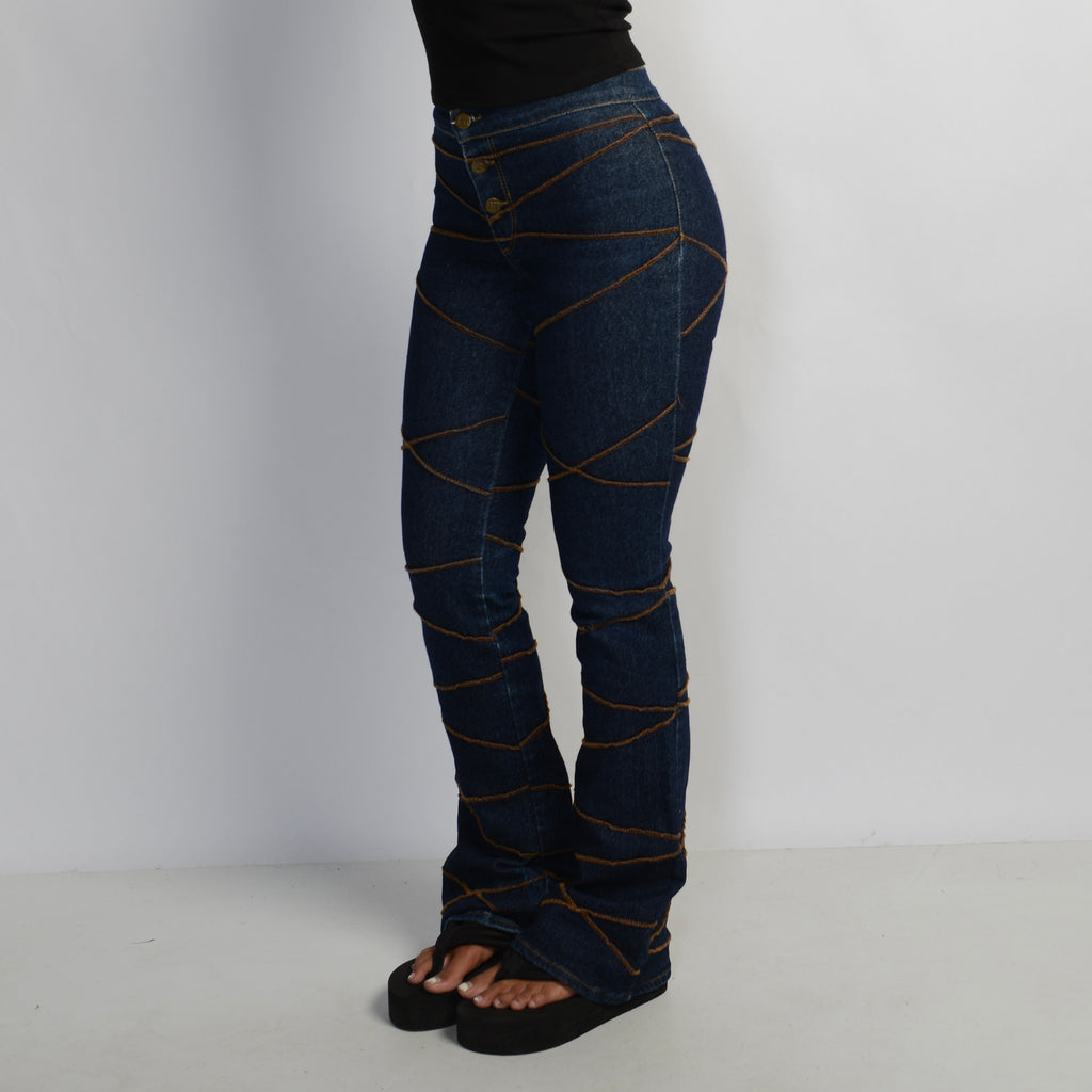 TEXTURED DENIM JEANS