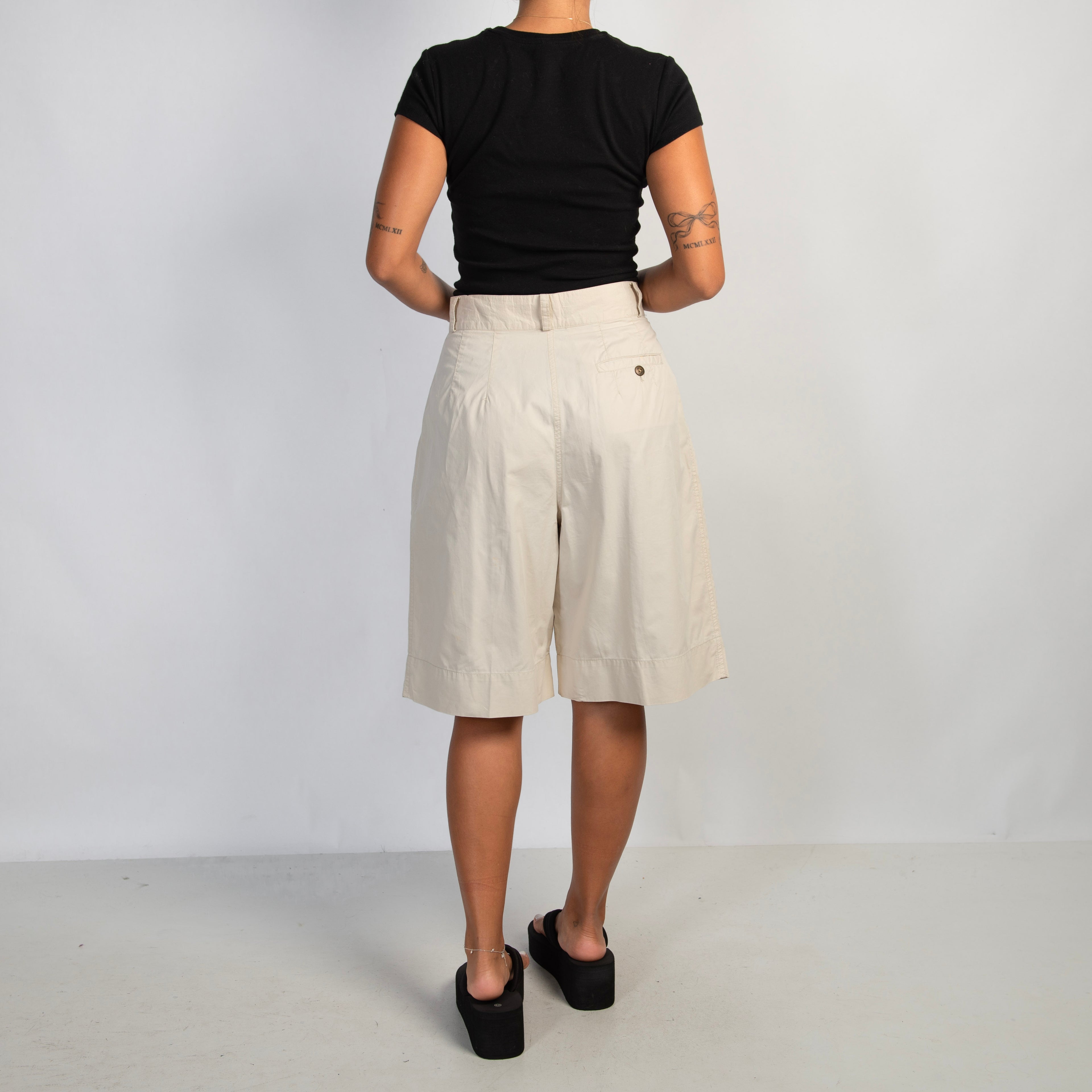 PLEATED LONGLINE SHORTS