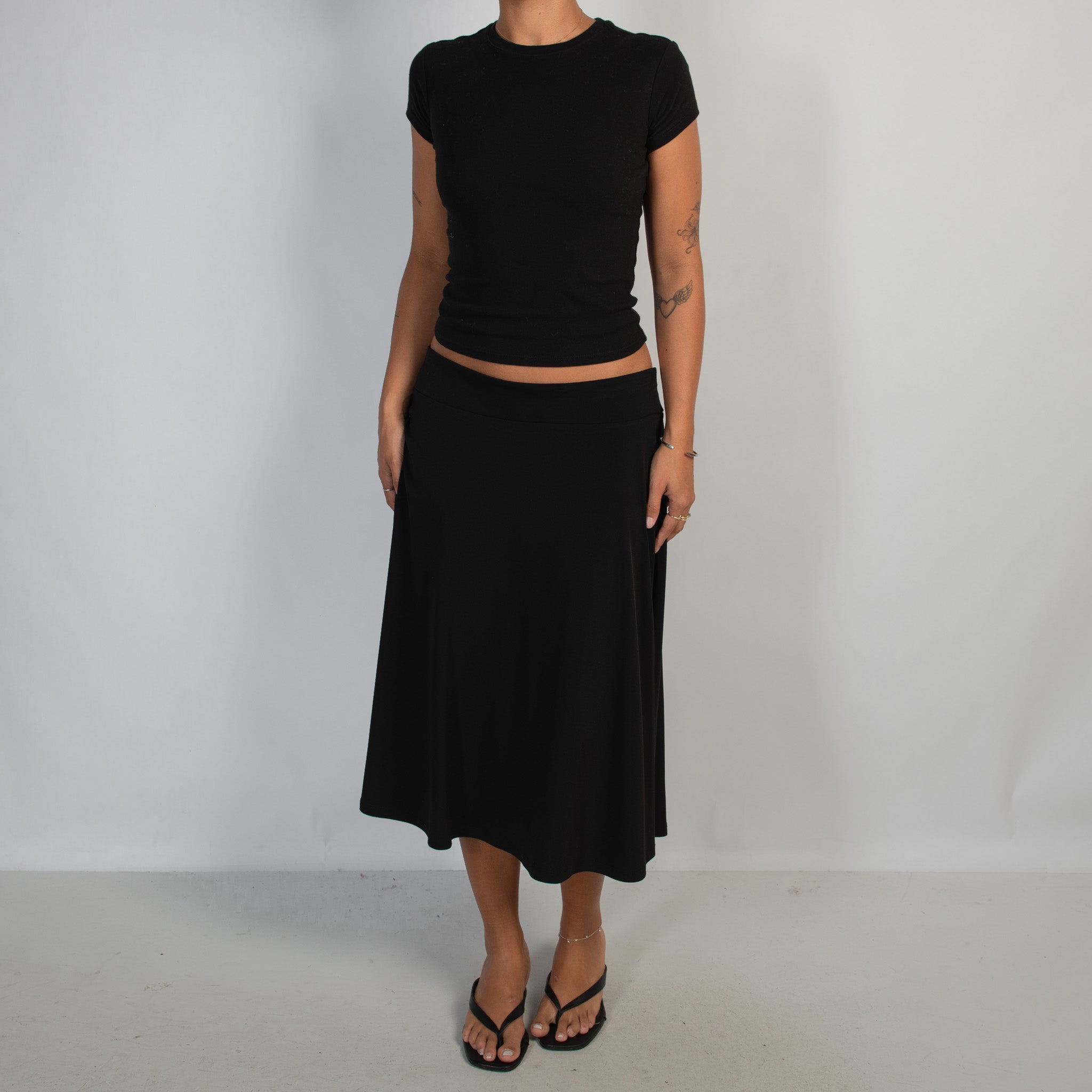 BLACK SLINKY MIDI SKIRT