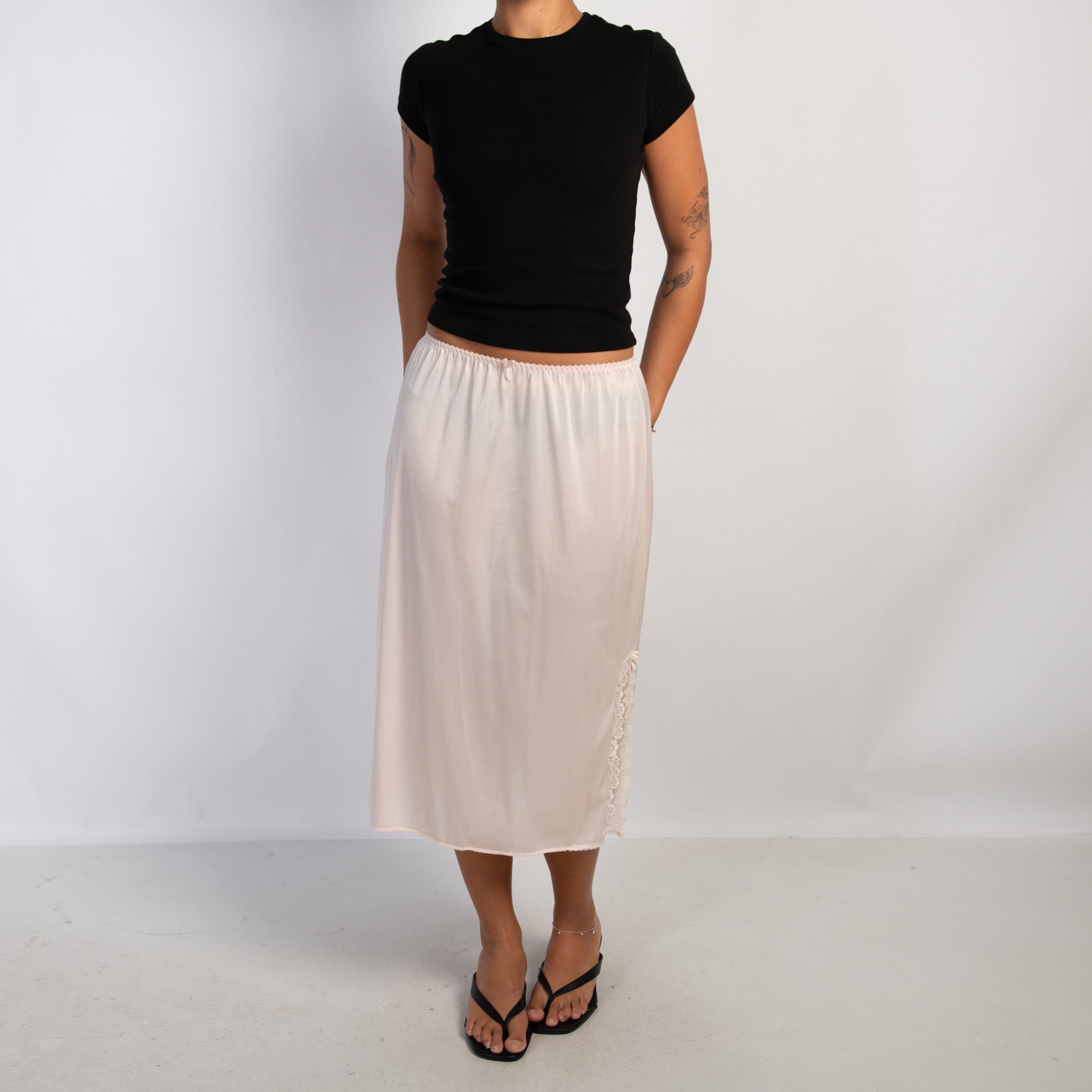 PALE PINK SLIP MIDI SKIRT