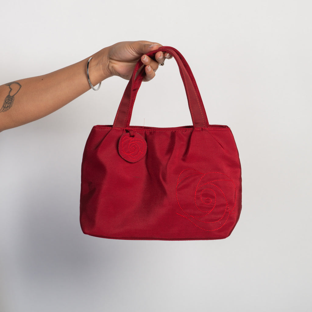 RED ROSETTE BAG