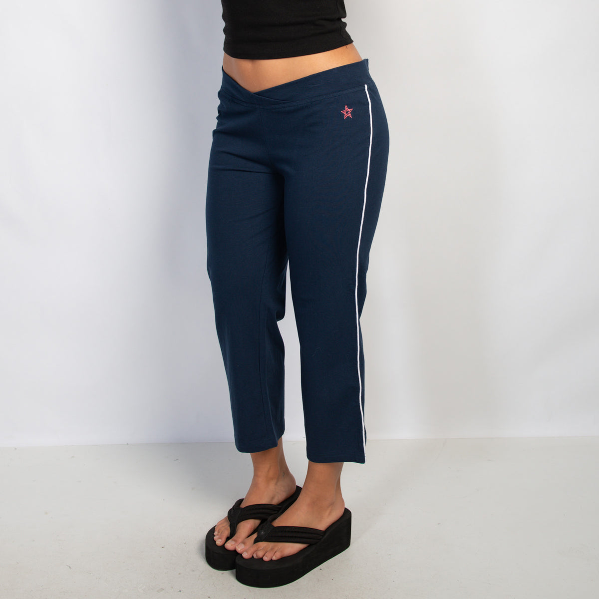 NAVY CROP KICK FLARE PANTS