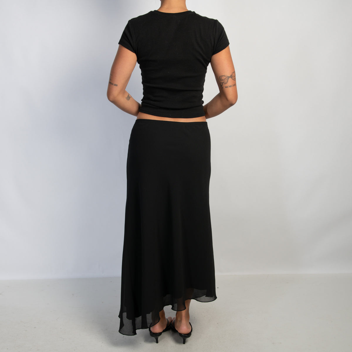 BLACK ASYMMETRIC SKIRT