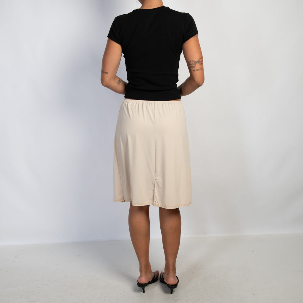 NUDE STRETCH SLIP SKIRT