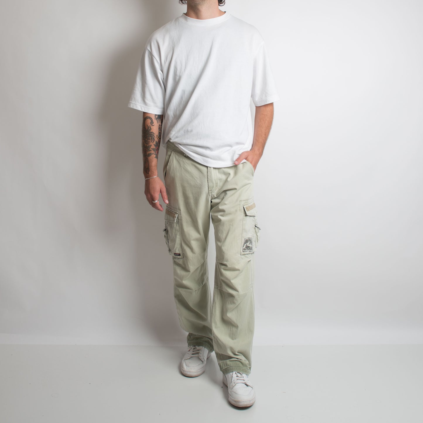 PALE GREEN CARGO TROUSERS